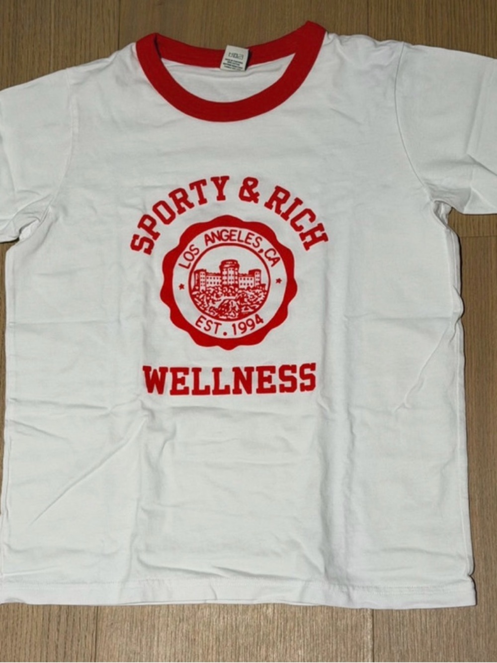 Sporty & Rich White Tee with Red Wellness Graphic